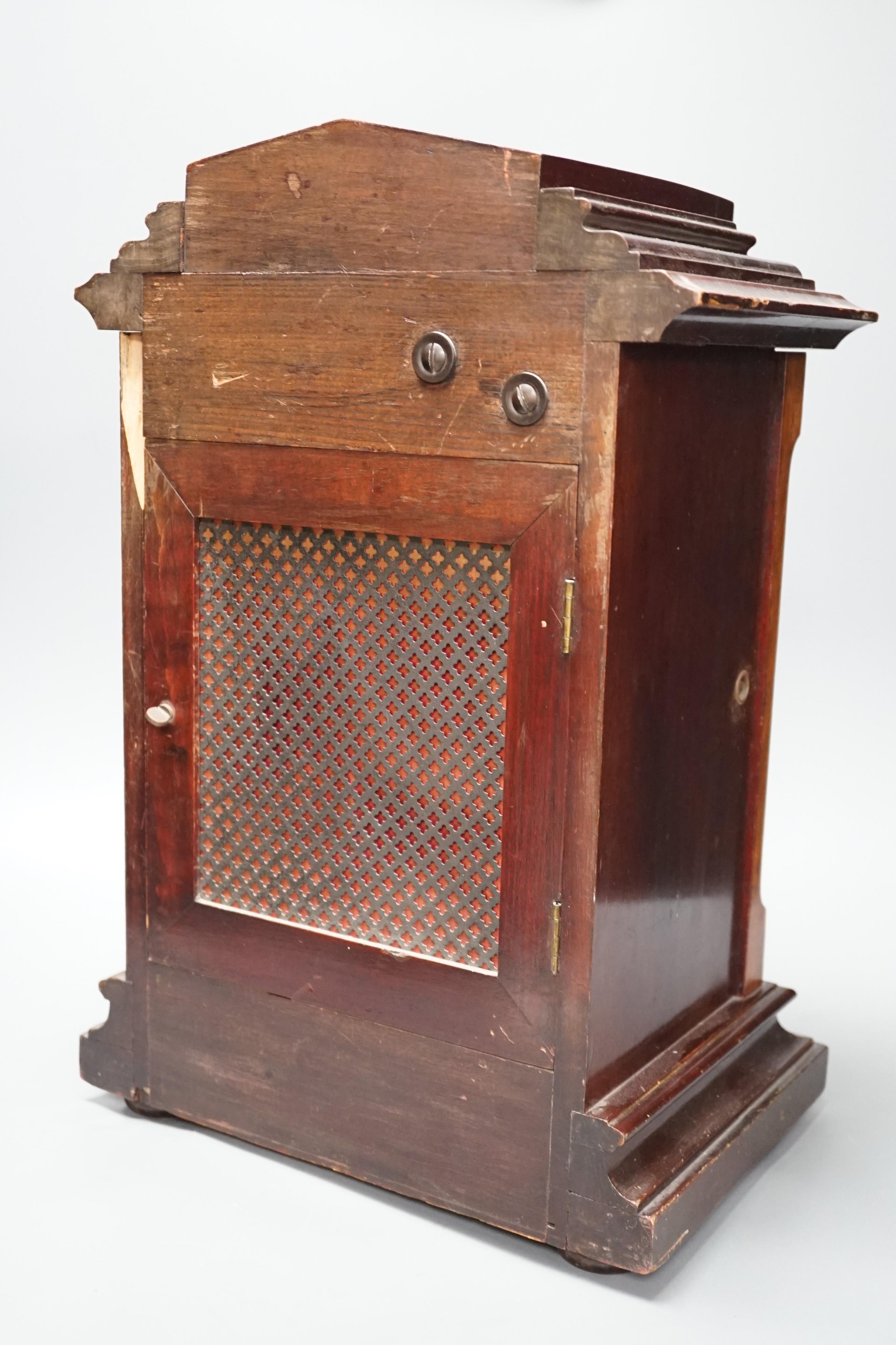 An early 20th century German walnut and marquetry chiming mantel clock, 42cms high